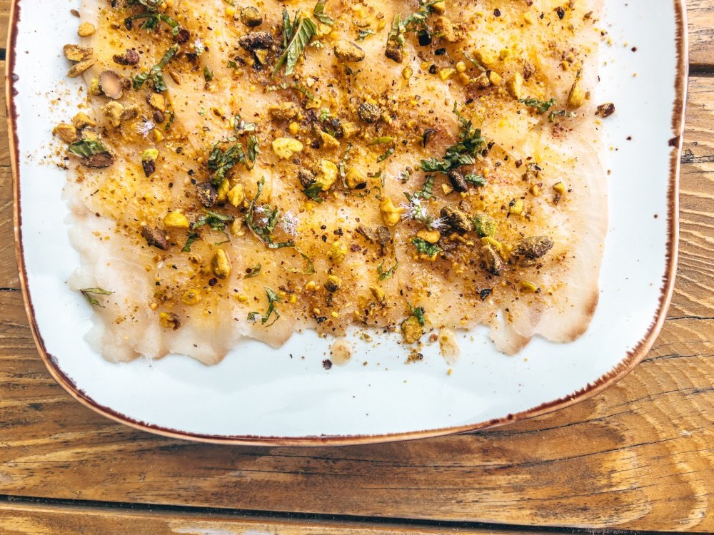 Mahi Carpaccio — seared mahi mahi carpaccio with pineapple, pistachio crumble
