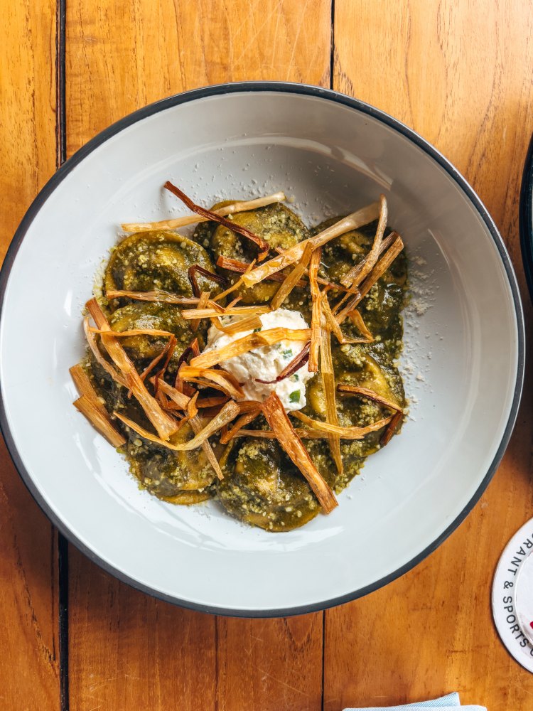 Mushroom Ravioli with ricotta cream and fried leeks